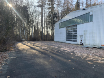 Freilagerfläche - Großzügige Lagerflächen: wärmegedämmte Kaltlagerhalle mit elektr. Rolltoren (ca. 800 m²) & Freilagerfl. (ca. 570 m²)