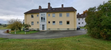 Außenansicht - Attraktives Immobilienpaket mit viel Potenzial: 12 MFH in Brunnenthal (Nähe Hof) – 52 WE – Grst. 19.168 m²